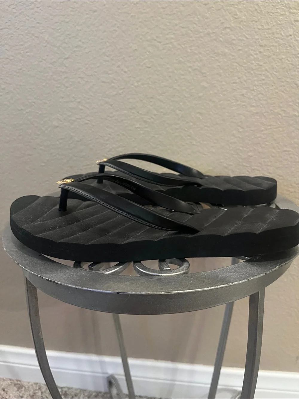 Tory Burch Black Quilted Flip Flops with Gold Logo Accent